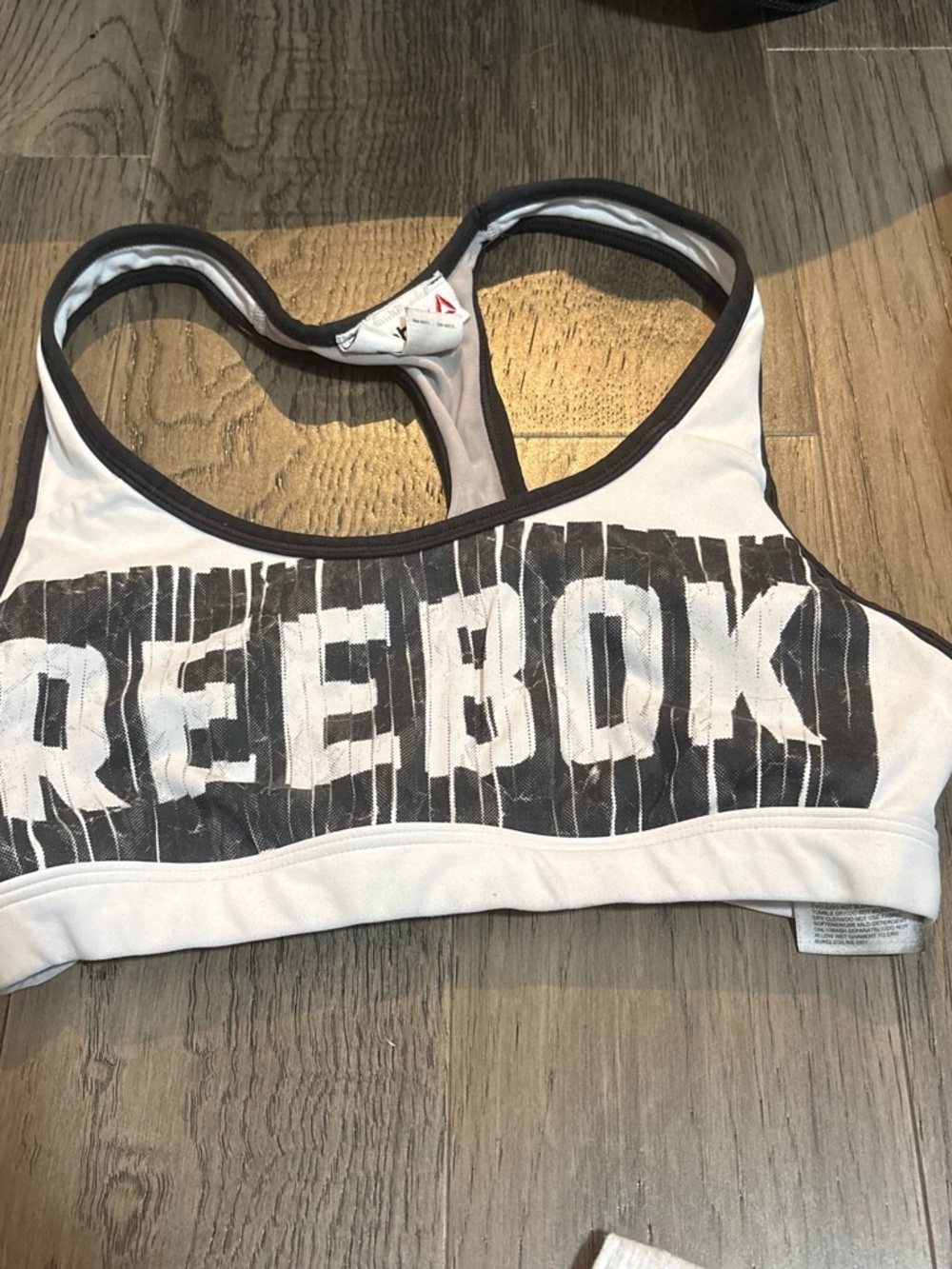 Reebok White Sports Bra with Black Graphic Logo